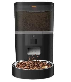 Automatic pet feeder dispensing dry food into bowl for dogs or cats