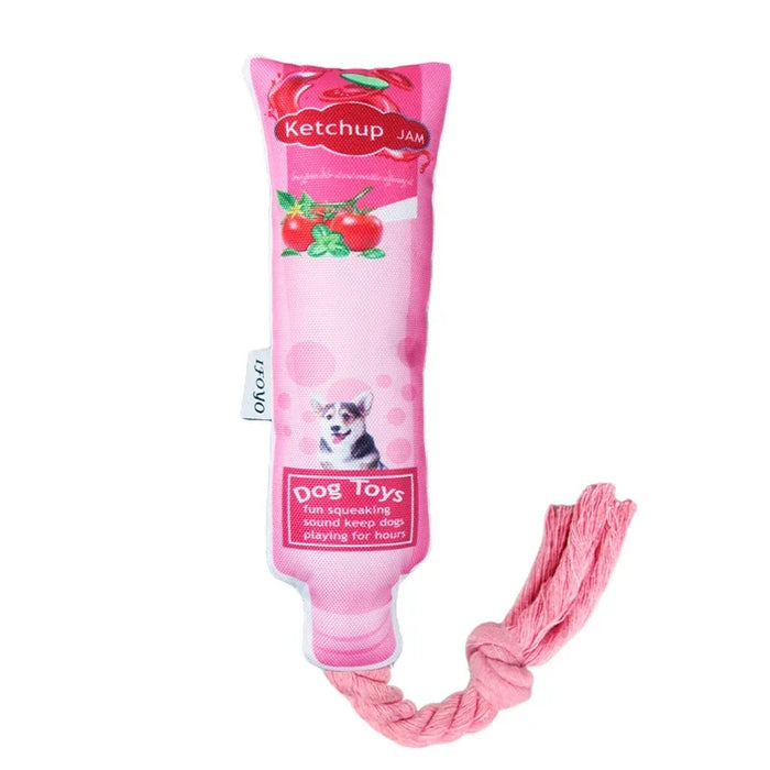 Pink ketchup bottle dog toy with rope, squeaky pet accessory for playful dogs