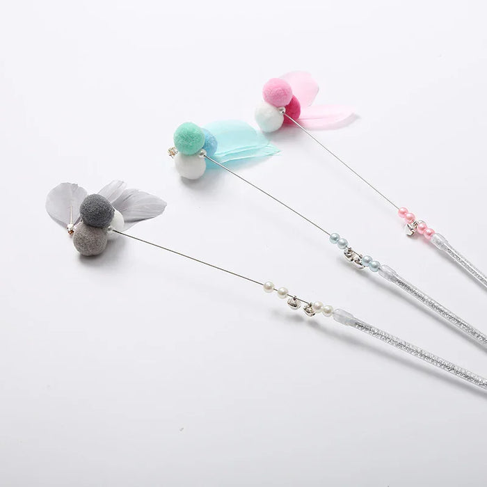 Colorful cat wands with pom-poms, feathers, and beads for interactive pet play and exercise