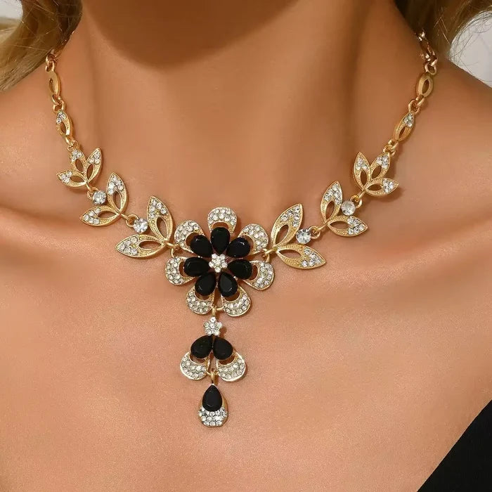 Elegant Gold Hollow Flower Necklace with Rhinestones