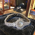 Elegant Zircon Quartz Women's Watch with LED & Steel Band