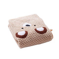 Folded beige plush pet blanket with a cute bear face design.
