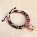 Floral pet collar with lucky cat charm, ideal for cats and small dogs