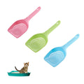 Pink, green, and blue cat litter scoops with kitten in litter box, pet care essentials