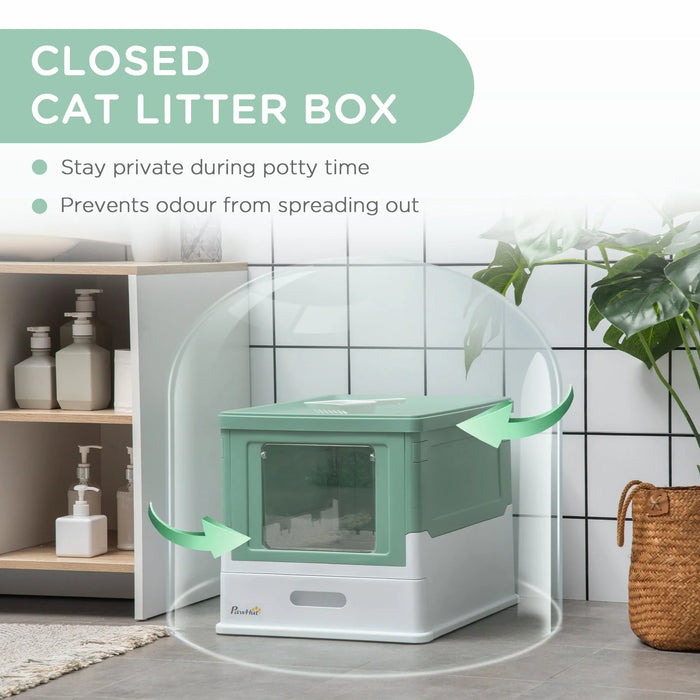 Mint green closed cat litter box with privacy cover, odor control, in modern bathroom setting