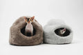 Two cats in cozy plush cat beds, perfect for pet comfort and warmth