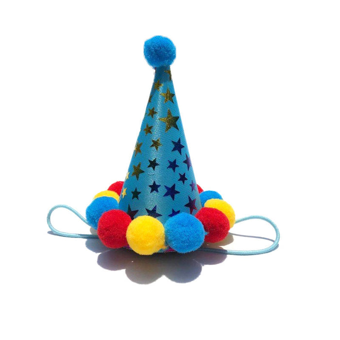 Blue cone-shaped pet party hat with gold stars and colorful pom-pom trim