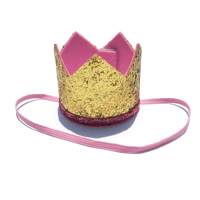Gold glitter pet crown with pink interior and adjustable elastic strap