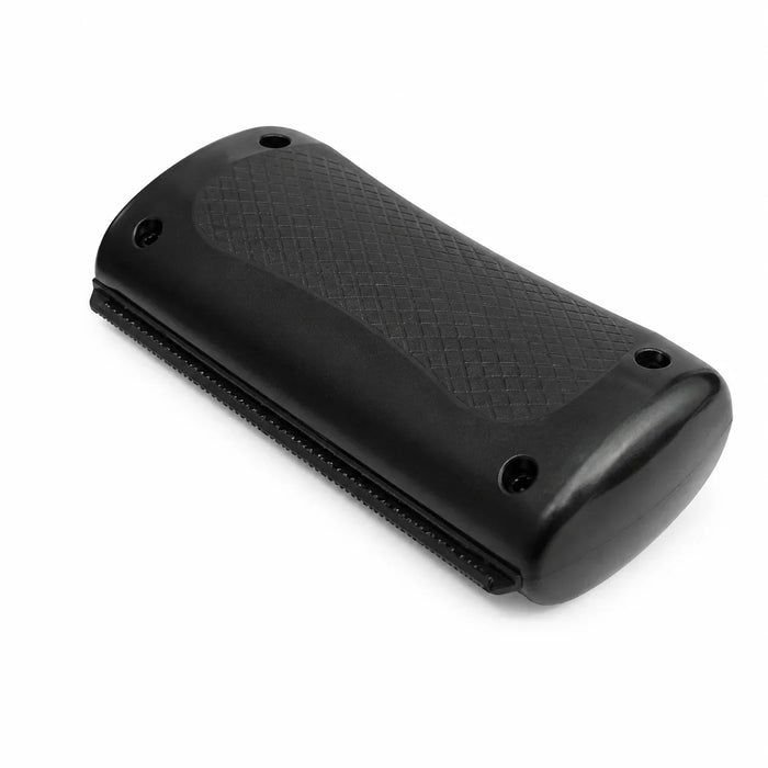 Black pet grooming tool with textured grip for dogs and cats