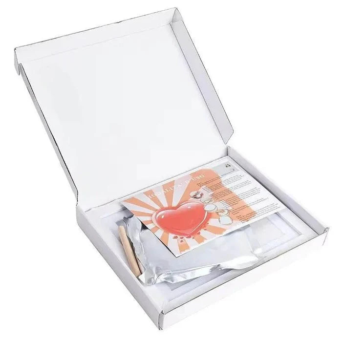 Pet care kit with heart design, includes tools and guide in white box