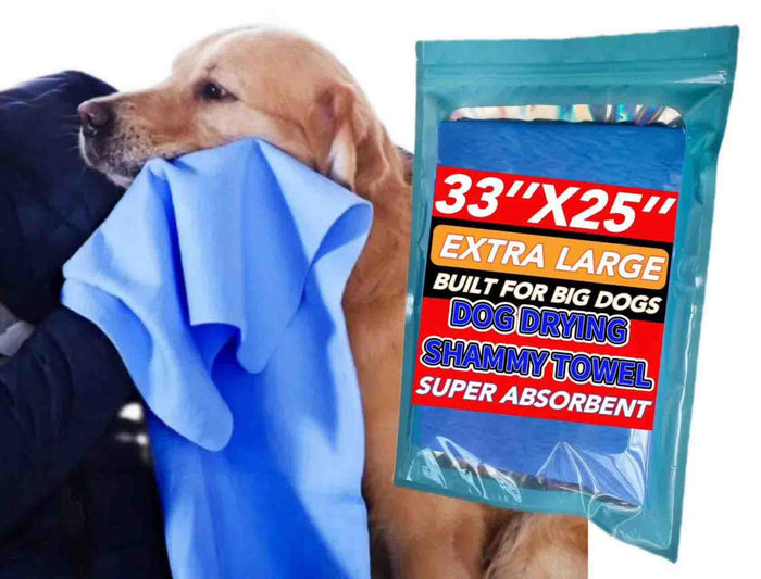 Large golden dog being dried with a blue extra large absorbent dog drying shammy towel.