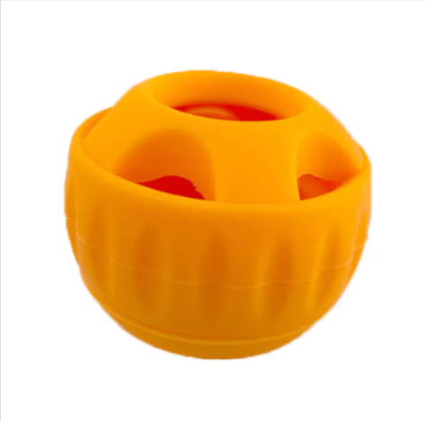 Bright orange dog treat ball toy with textured grip and treat compartments for interactive play
