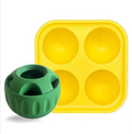 Green dog puzzle toy and yellow silicone treat mold for pet enrichment and training