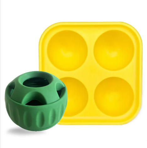 Green dog puzzle toy and yellow silicone treat mold for pet enrichment and training