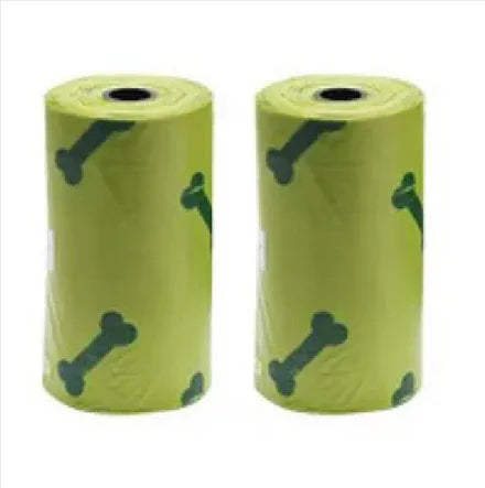 Green dog waste bags with bone print, pet essentials for cleanups