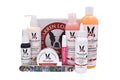 Warren London dog grooming kit including shampoo, conditioner, paw wax, and ear cleaner.